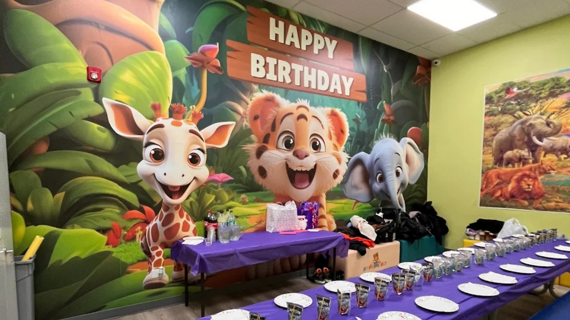 Jungle-themed private party room set up for a kids birthday celebration at Hyper Kidz Bolingbrook